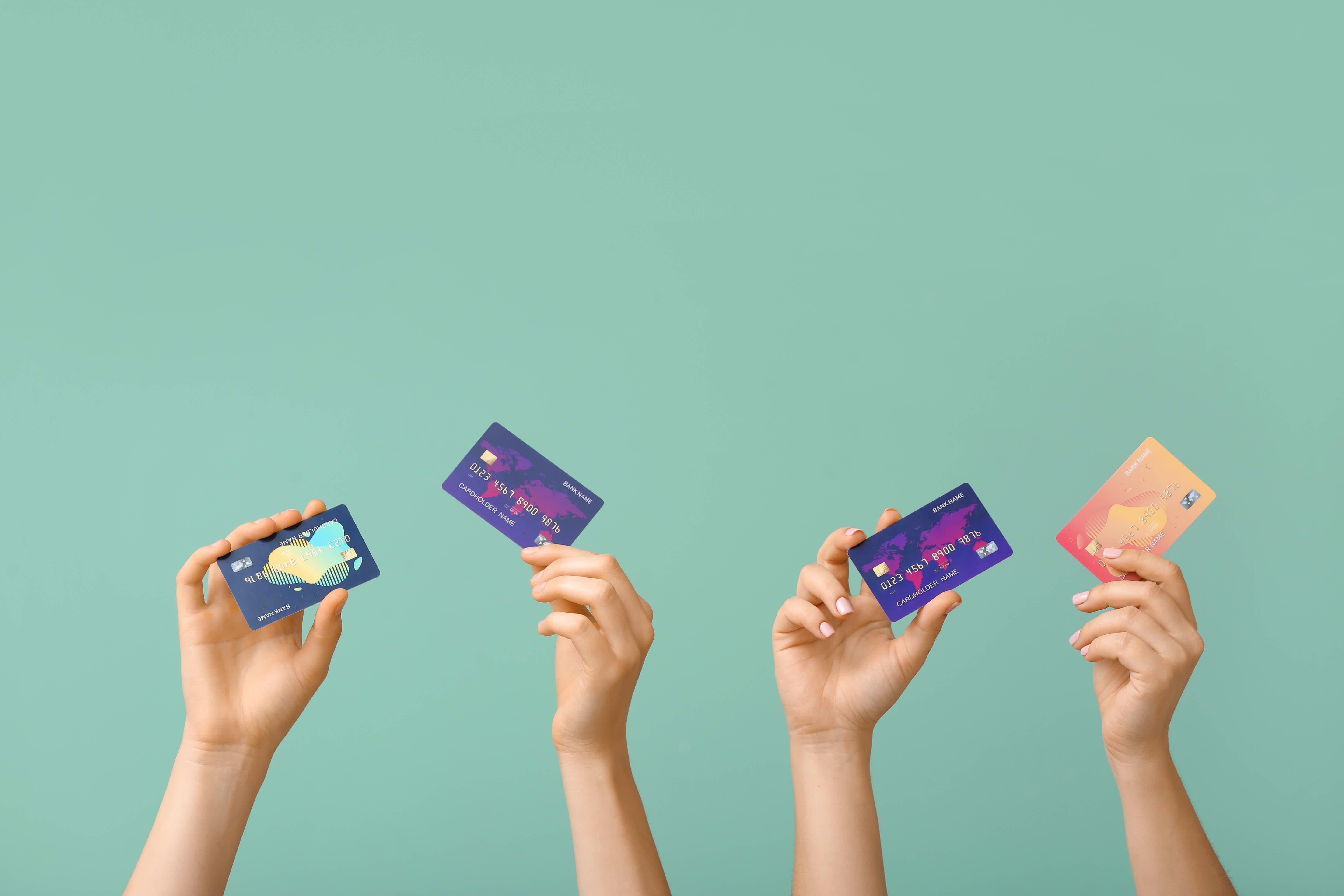 Check out our list of the four best secured cards for raising your score! Source: Adobe Stock.