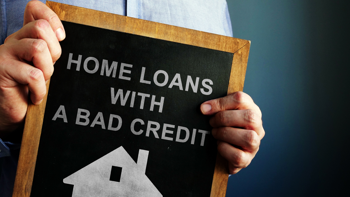 Learn how to get a mortgage with poor credit! Source: Adobe Stock.