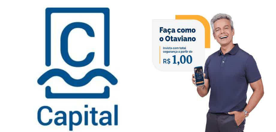 À esquerda, logo e símbolo da corretora CM Capital. À direita, Otaviano Costa, garoto propaganda da corretora, segura um celular nas mãos.