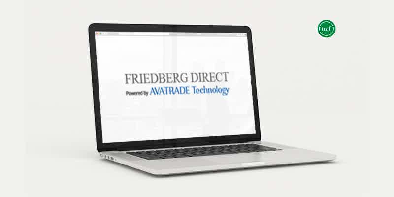 image of a laptop with the Friedberg Direct (AvaTrade) logo