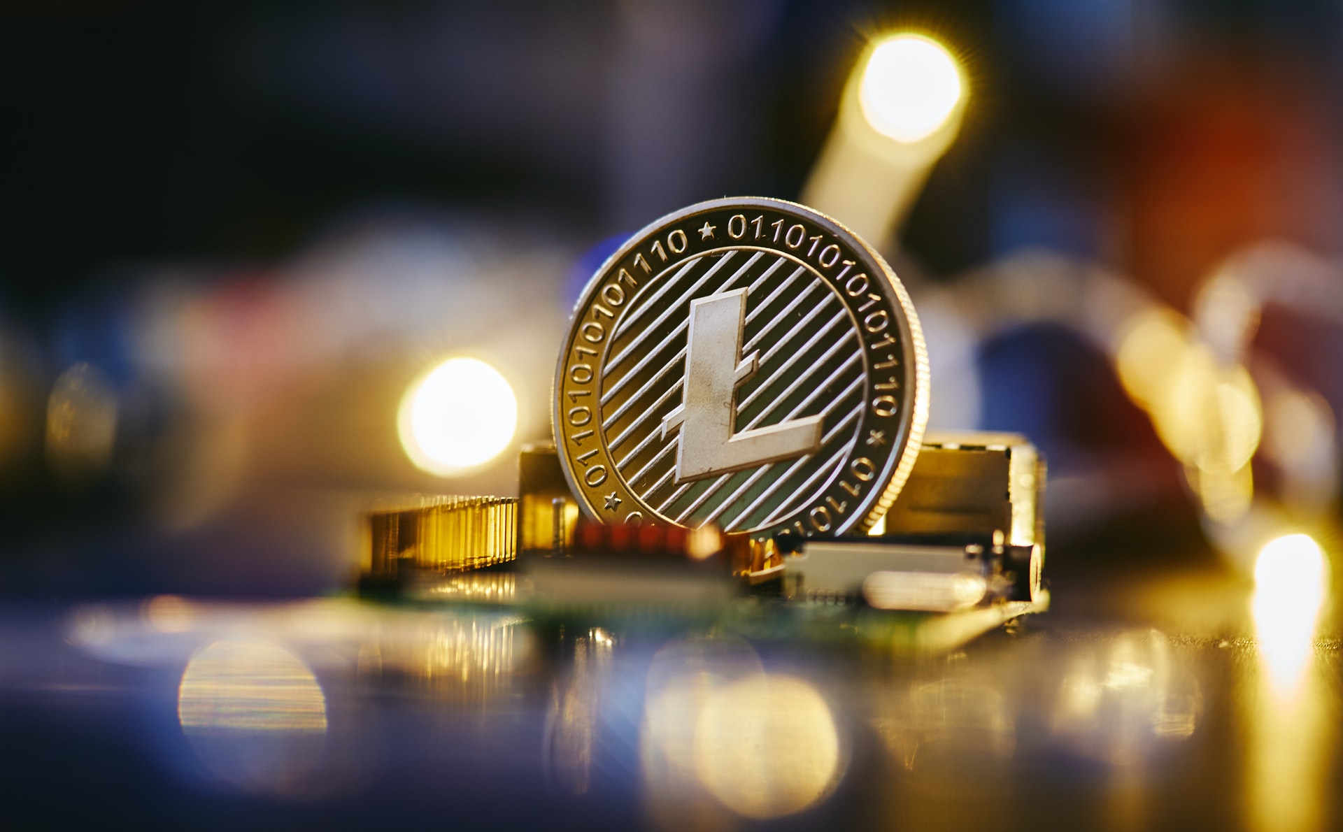 physical representation of a Litecoin on top of a blurred out background